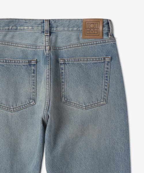 Distressed Twisted Seam Denim Pants - Light Blue / 213232741404